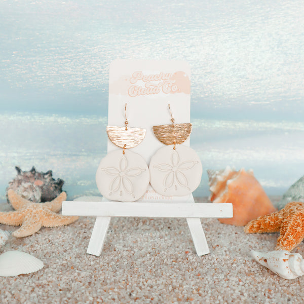 Gleaming Sand Dollars